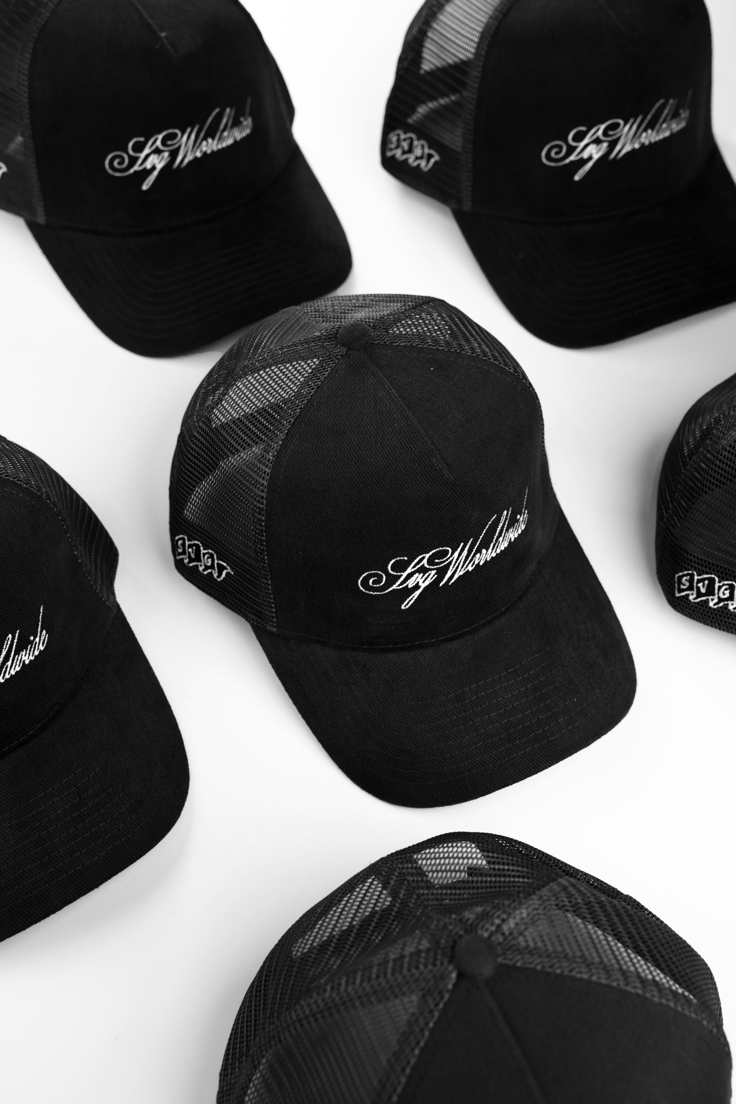 Cursive Black Trucker Cap